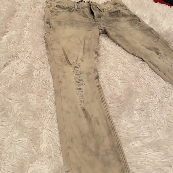 Express distressed stretched stone washed jeans. - Picture 2 of 9